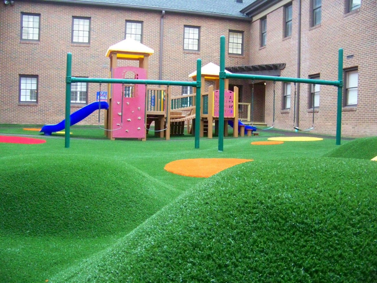 Hilly artificial turf playground by Southwest Greens of Eastern Washington